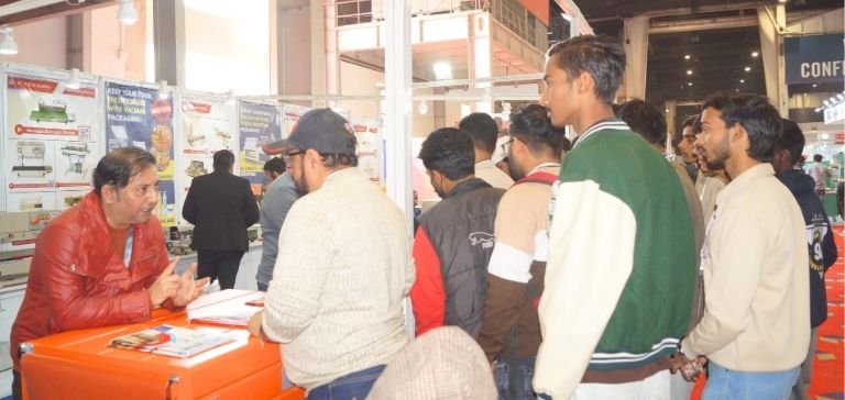 Students at print pack discussing about print outputs